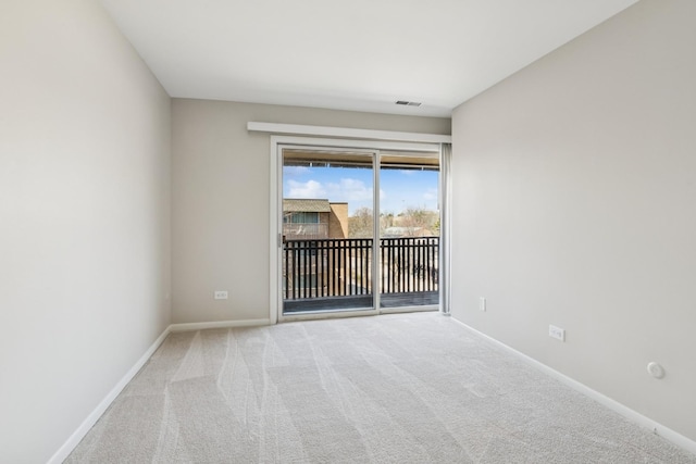 1927 Tanglewood Dr Unit 4A, Glenview, IL 60025 - carpeted spare room with baseboards and visible vents