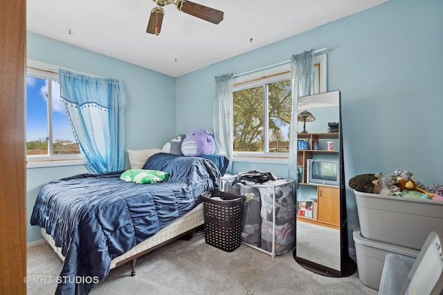 bedroom featuring carpet flooring and a ceiling fan
