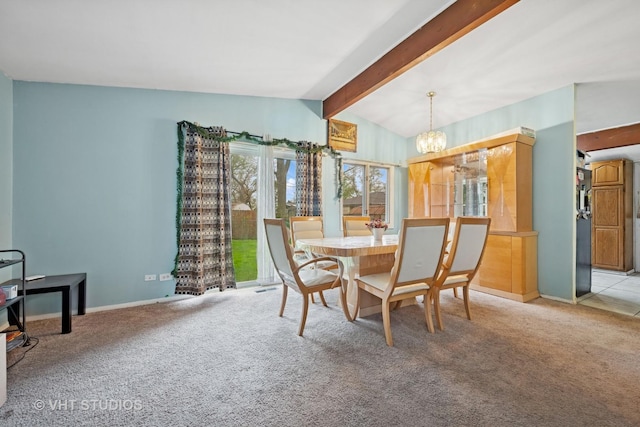 dining area with baseboards, vaulted ceiling with beams, light carpet, and a chandelier