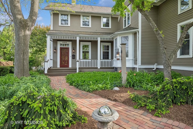 209 W Lake St, Barrington, IL 60010 - view of front of home featuring a porch and a shingled roof