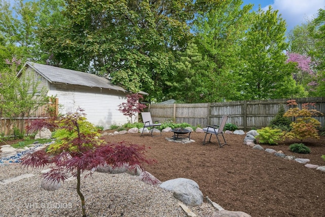 209 W Lake St, Barrington, IL 60010 - view of yard featuring an outdoor fire pit and an outbuilding