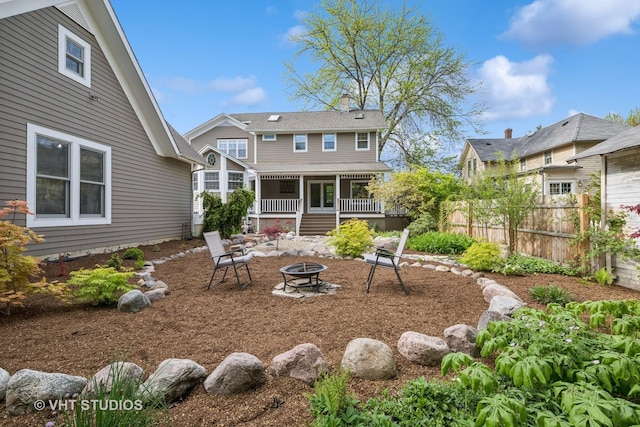 209 W Lake St, Barrington, IL 60010 - rear view of house with a fire pit and a chimney