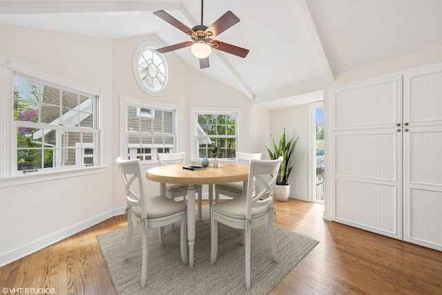 209 W Lake St, Barrington, IL 60010 - dining room featuring baseboards, a ceiling fan, plenty of natural light, light wood-style flooring, and beamed ceiling