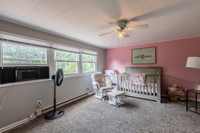 112 E Peru St, Princeton, IL 61356 - carpeted bedroom featuring cooling unit, a ceiling fan, and a crib