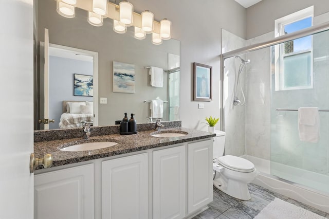 625 W Patterson Ave Unit 3E, Chicago, IL 60613 - ensuite bathroom with a stall shower, toilet, and double vanity