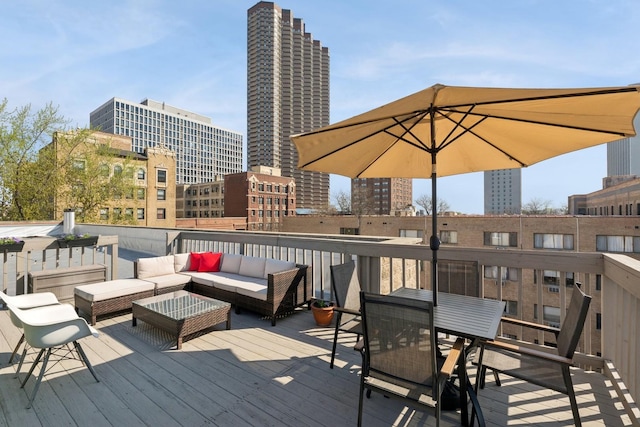 625 W Patterson Ave Unit 3E, Chicago, IL 60613 - wooden terrace with an outdoor living space and a city view