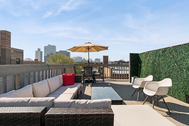 625 W Patterson Ave Unit 3E, Chicago, IL 60613 - view of patio with an outdoor living space, outdoor dining space, and a deck