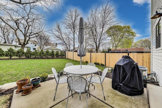 view of patio / terrace with outdoor dining area and a fenced backyard