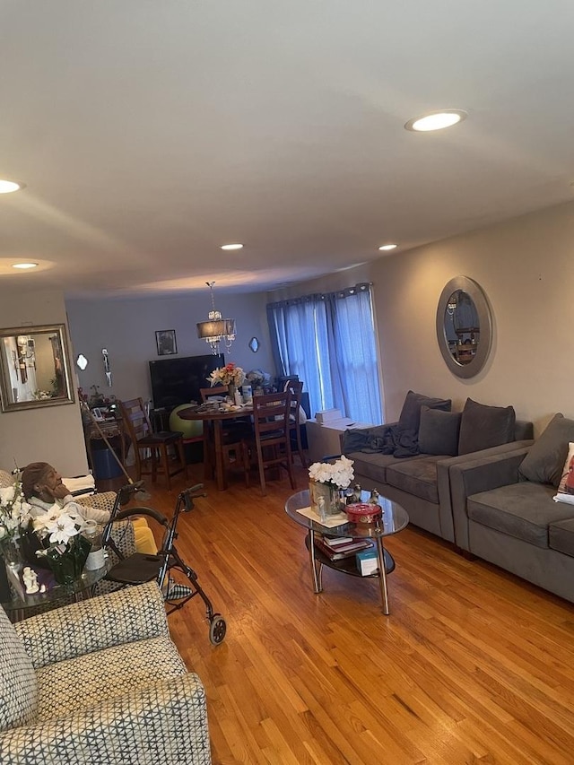 1641 Patricia Pl, Calumet City, IL 60409 - living area featuring light wood-style flooring, recessed lighting, and a chandelier