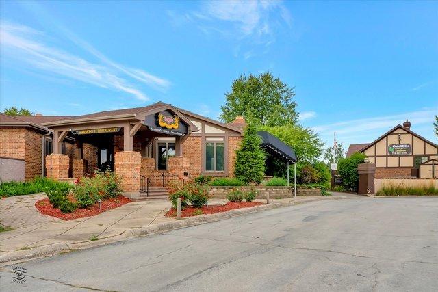 view of front of property with brick siding