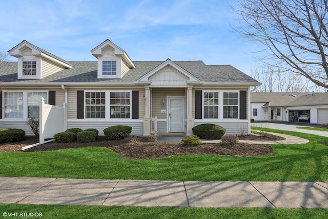 13425 Michigan Ave, Huntley, IL 60142 - cape cod house featuring roof with shingles and a front lawn