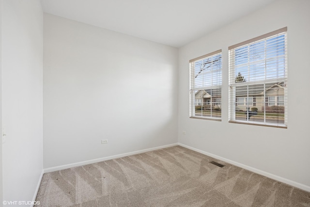 13425 Michigan Ave, Huntley, IL 60142 - unfurnished room featuring visible vents, baseboards, and carpet