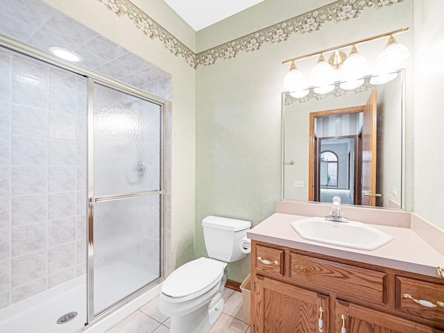 165 Fairfield Dr Unit 35B, New Lenox, IL 60451 - full bath featuring a stall shower, toilet, vanity, and tile patterned flooring