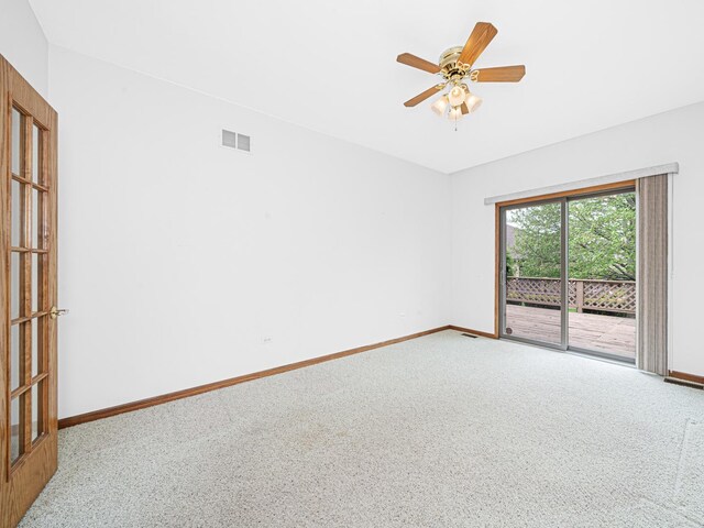 165 Fairfield Dr Unit 35B, New Lenox, IL 60451 - spare room with baseboards, carpet floors, and ceiling fan