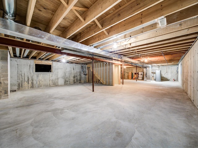 165 Fairfield Dr Unit 35B, New Lenox, IL 60451 - unfinished below grade area featuring gas water heater