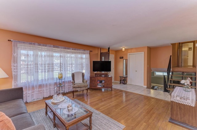 1735 W Woodland Ave, Addison, IL 60101 - living room with light wood-type flooring and baseboards