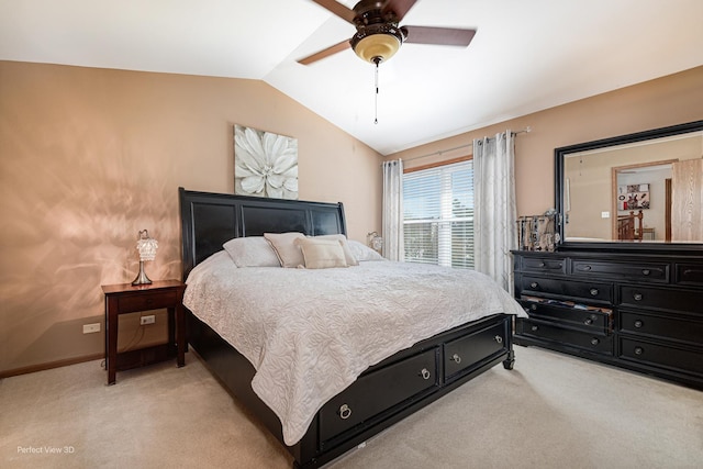 bedroom featuring lofted ceiling, ceiling fan, baseboards, and light colored carpet