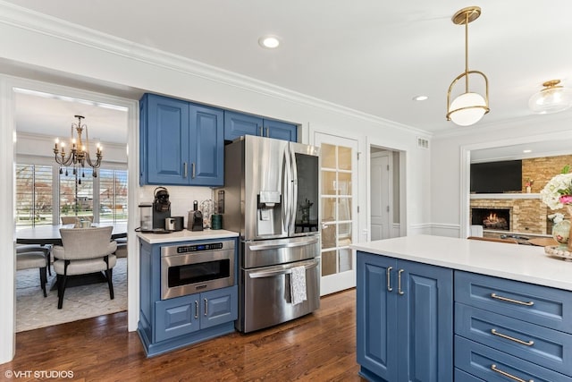 1181 Furlong Dr, Libertyville, IL 60048 - kitchen featuring dark wood finished floors, blue cabinetry, and stainless steel appliances