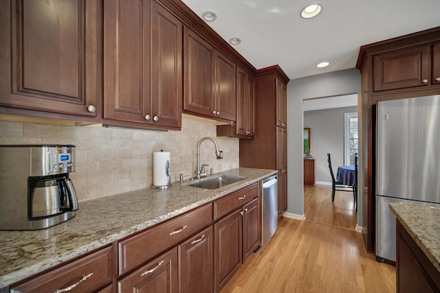 2005 Brentwood Ln, Wheaton, IL 60189 - kitchen with tasteful backsplash, appliances with stainless steel finishes, baseboards, and a sink