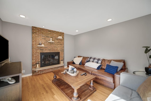 2005 Brentwood Ln, Wheaton, IL 60189 - living area with baseboards, recessed lighting, light wood finished floors, and a fireplace