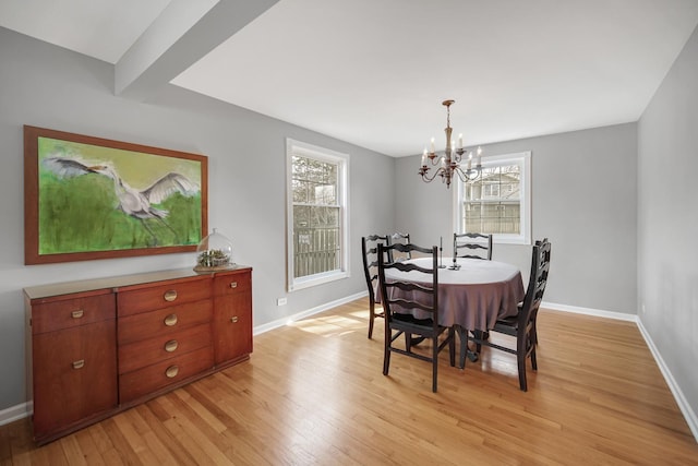 2005 Brentwood Ln, Wheaton, IL 60189 - dining room with a chandelier, light wood-type flooring, and baseboards