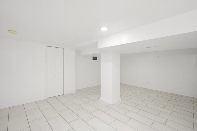 finished below grade area with recessed lighting