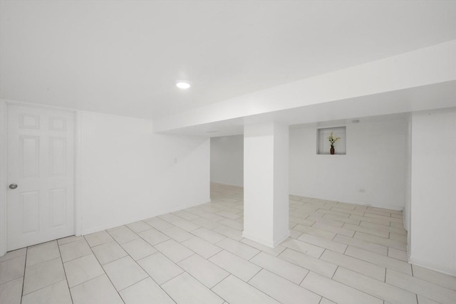 finished basement featuring recessed lighting