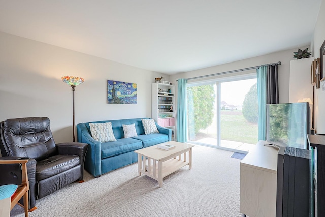 living room featuring light colored carpet