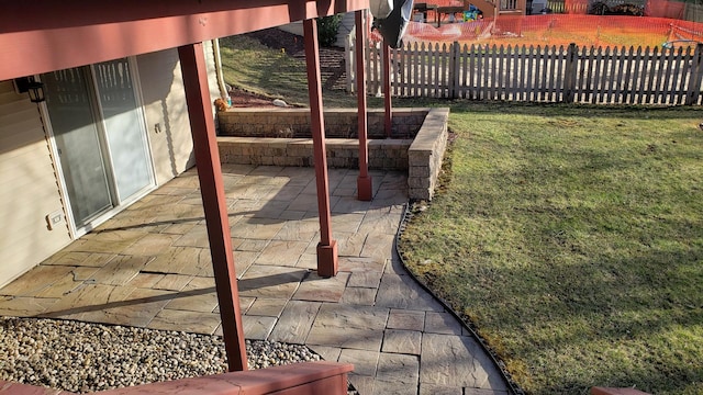 exterior space featuring a patio area and fence