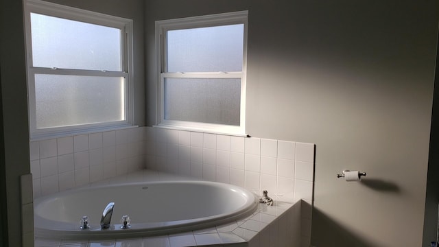 full bath with a garden tub