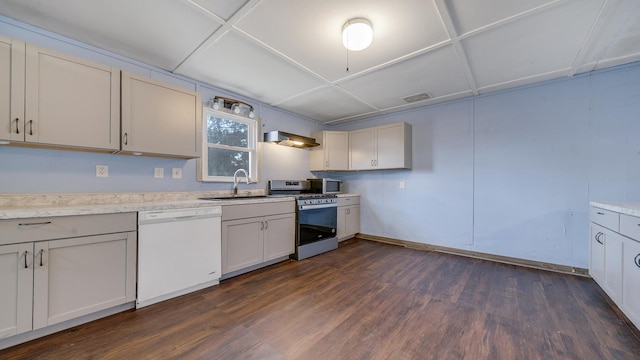 kitchen featuring visible vents, white dishwasher, a sink, stainless steel microwave, and gas stove