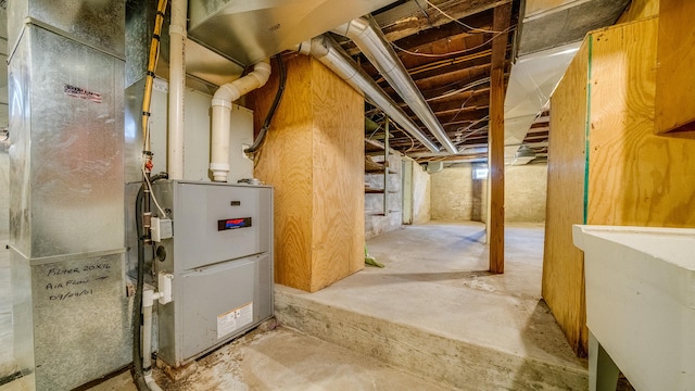 unfinished below grade area with a sink