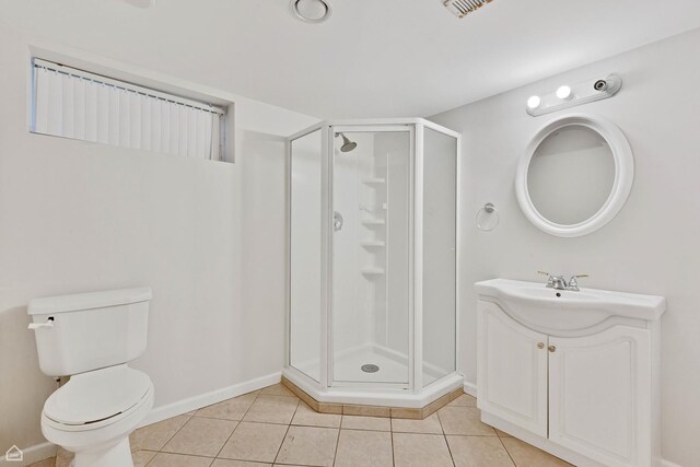 5753 S Moody Ave, Chicago, IL 60638 - bathroom featuring a stall shower, vanity, toilet, tile patterned floors, and baseboards