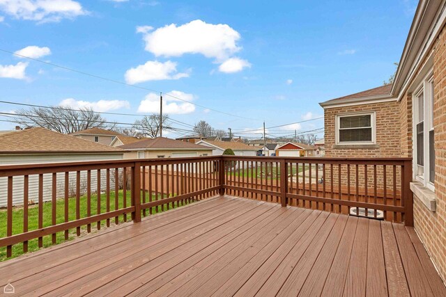 5753 S Moody Ave, Chicago, IL 60638 - wooden terrace with fence, a residential view, and a lawn