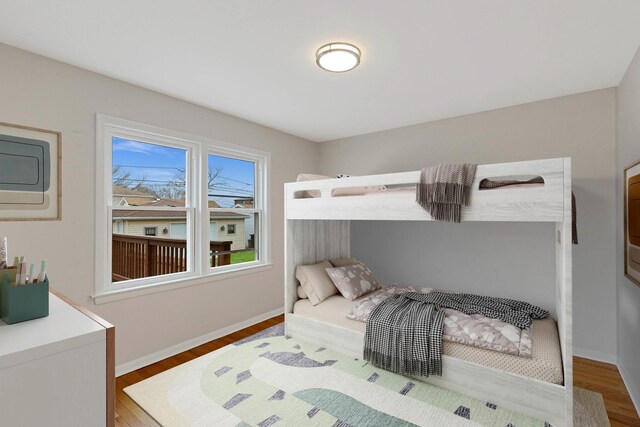 5753 S Moody Ave, Chicago, IL 60638 - bedroom featuring wood finished floors and baseboards
