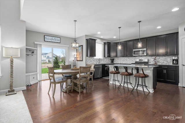 6625 Savanna Ln, Lakewood, IL 60014 - dining area with dark wood-style flooring, recessed lighting, and baseboards