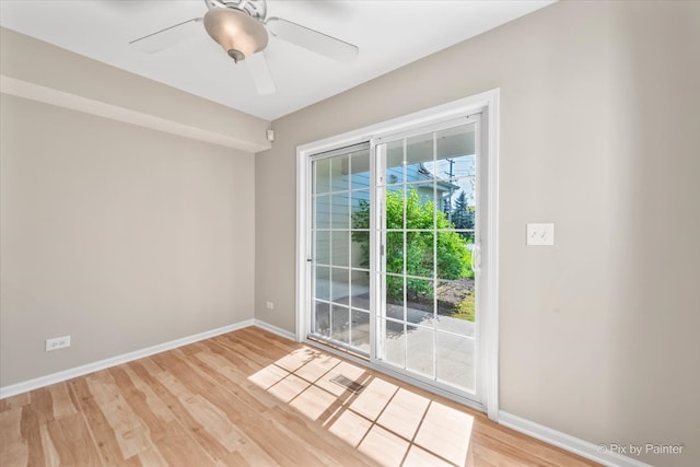 9531 Lenox Ln, Lakewood, IL 60014 - empty room with light wood-type flooring, baseboards, and ceiling fan
