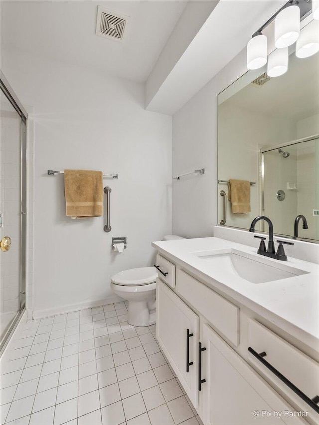 9531 Lenox Ln, Lakewood, IL 60014 - full bathroom with a stall shower, tile patterned flooring, vanity, and toilet
