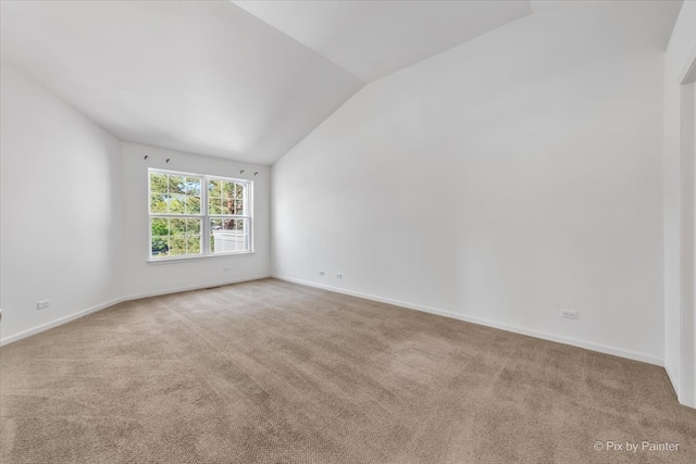 9531 Lenox Ln, Lakewood, IL 60014 - carpeted empty room with vaulted ceiling and baseboards
