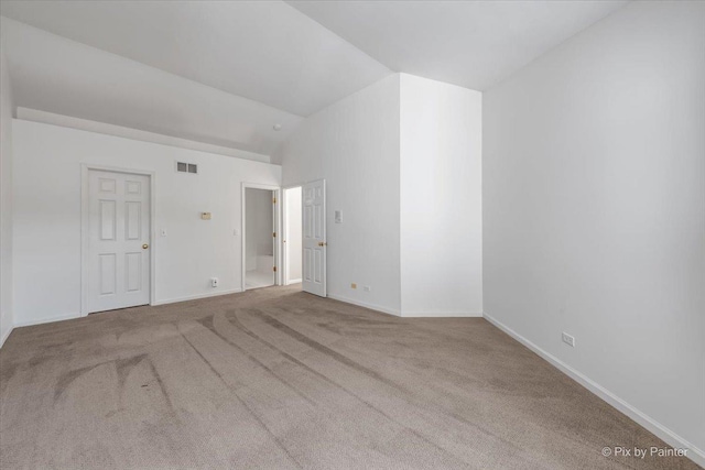 9531 Lenox Ln, Lakewood, IL 60014 - carpeted empty room featuring vaulted ceiling and baseboards