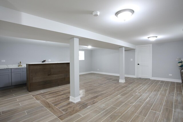 9046 S Racine Ave, Chicago, IL 60620 - basement with light wood-style floors and baseboards