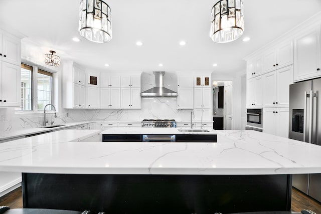 22328 N Prairie Ct, Kildeer, IL 60047 - kitchen featuring wall chimney exhaust hood, a sink, a large island with sink, appliances with stainless steel finishes, and recessed lighting