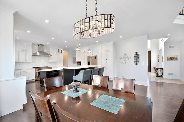 22328 N Prairie Ct, Kildeer, IL 60047 - dining room featuring recessed lighting, baseboards, dark wood-style floors, and a chandelier