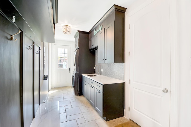 22328 N Prairie Ct, Kildeer, IL 60047 - kitchen featuring a sink, tasteful backsplash, and light stone counters