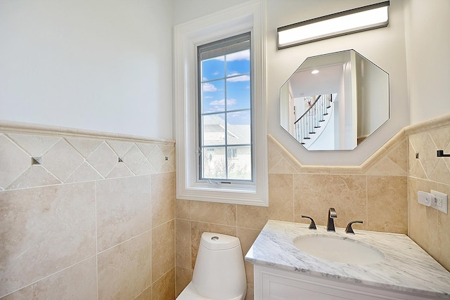22328 N Prairie Ct, Kildeer, IL 60047 - half bath featuring tile walls, wainscoting, vanity, and toilet
