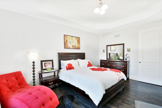 22328 N Prairie Ct, Kildeer, IL 60047 - bedroom featuring dark wood-style flooring, a raised ceiling, baseboards, and a chandelier