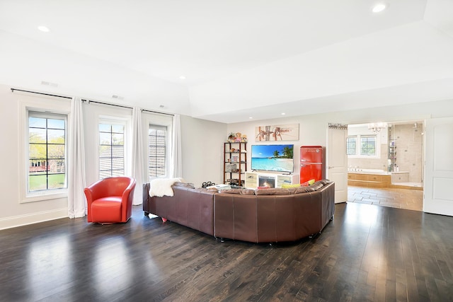 22328 N Prairie Ct, Kildeer, IL 60047 - living area featuring dark wood-type flooring, recessed lighting, plenty of natural light, lofted ceiling, and baseboards