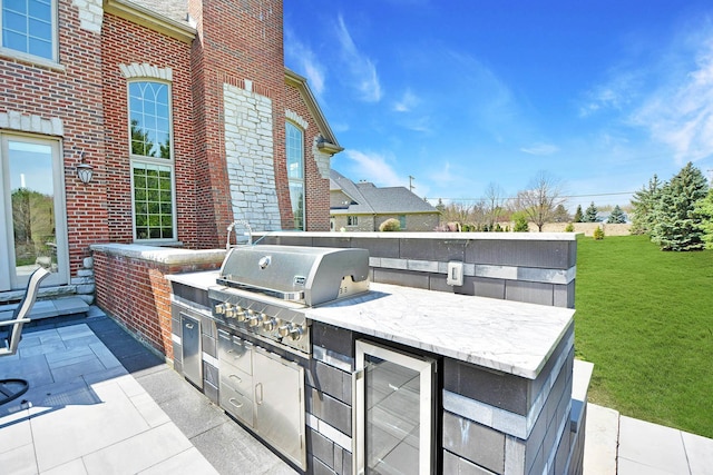 22328 N Prairie Ct, Kildeer, IL 60047 - view of patio / terrace featuring a grill, wine cooler, and an outdoor kitchen