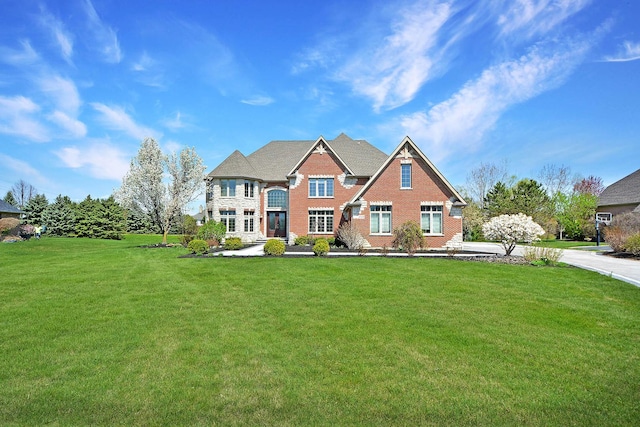 22328 N Prairie Ct, Kildeer, IL 60047 - view of front facade with a front lawn and brick siding