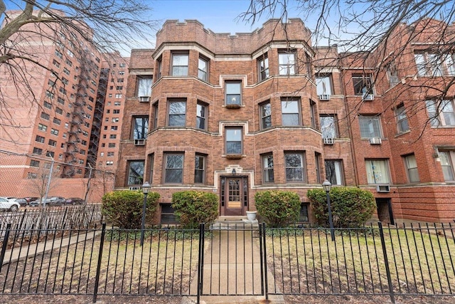 view of property featuring a fenced front yard